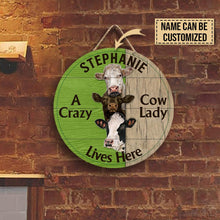 Load image into Gallery viewer, A Carzy Cow Lives Here Custom Name Round Wooden Sign Decor
